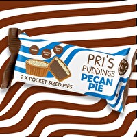 Die Pecan Pie von Pri's Puddings sind zwei Haferkekse in Törtchenform mit einer Füllung aus Datteln und einem leckeren Topping aus Pekannuss-Krümeln. Typisch englische Backtradition mit einem gewissen Etwas - perfekt für Genießer!