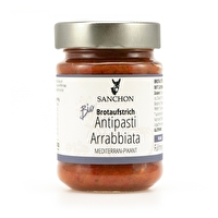 Antipasti Aufstrich Arrabbiata von Sanchon ist ein feiner veganer Brotaufstrich auf Basis von sonnengereiften Tomaten mit pikanter Cayenne-Pfeffer Note.
